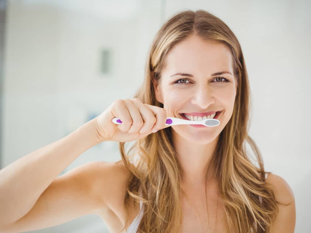 Creating a consistent oral health routine with a soft toothbrush is important for protecting gum tissue and reducing the risk of receding gums.