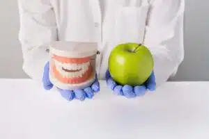 It is important to chew on both sides of the mouth evenly in order to keep the dentures in place while eating